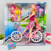 Thumbnail for bearily girl with small doll and bicycle